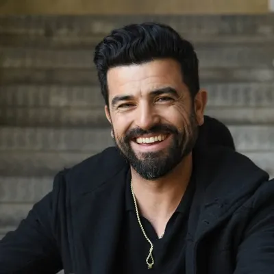 Amos Tamam profile