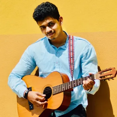 Aniket Daddikar | Singer Goa | Performer | Guitarist | Goa profile
