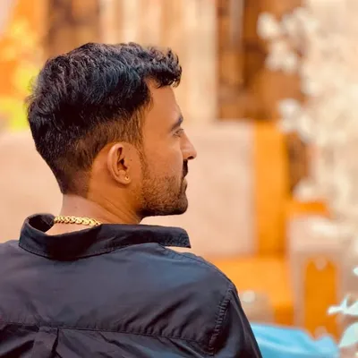 B L Hudda profile