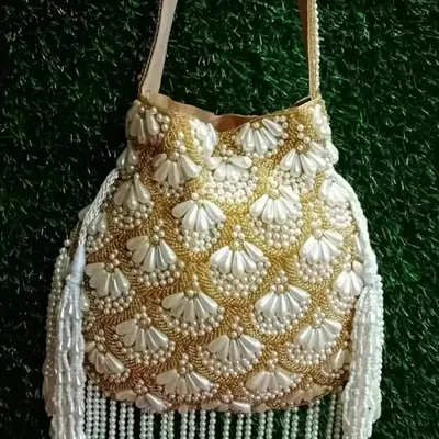 Husain's Collection | clutches,potlies,bohobags profile