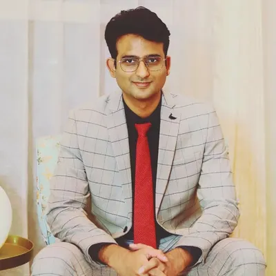 Dr Praveen Tripathi