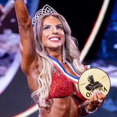 Isa Pereira - Olympia Champion profile