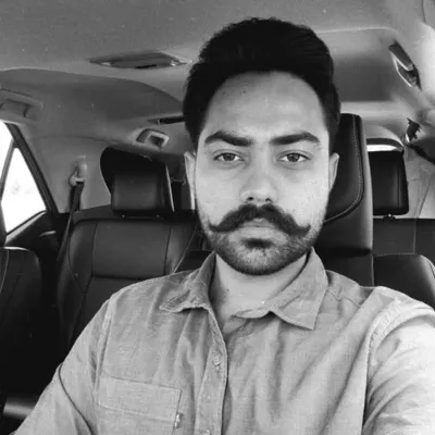 Joman Sandhu profile