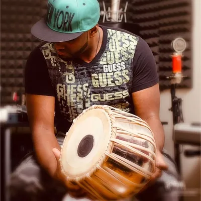Jomy George music profile