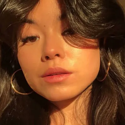 Milou Tjioe profile