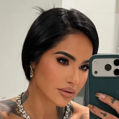 Corina Curatola profile