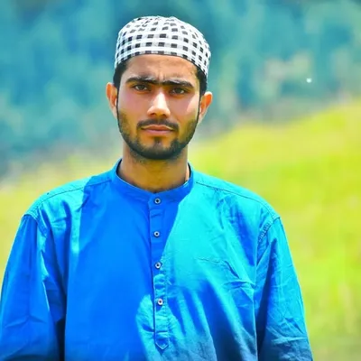 Muzaffar Ahmad profile