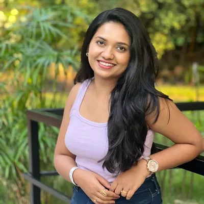 Nidhi D