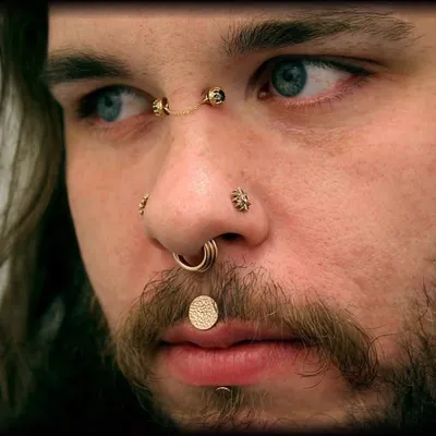 BODY PIERCER ROY FOWLER profile