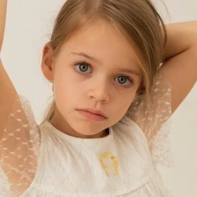 Puttmann for AIGNER KIDS profile