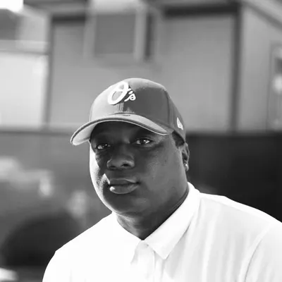 Quinelle "Coach Q" Holder profile