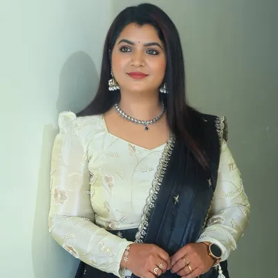 Rekha V