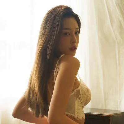 CAI XIN profile