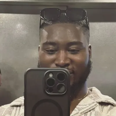 Tomi Adenaike profile